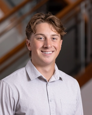smiling person in professional attire